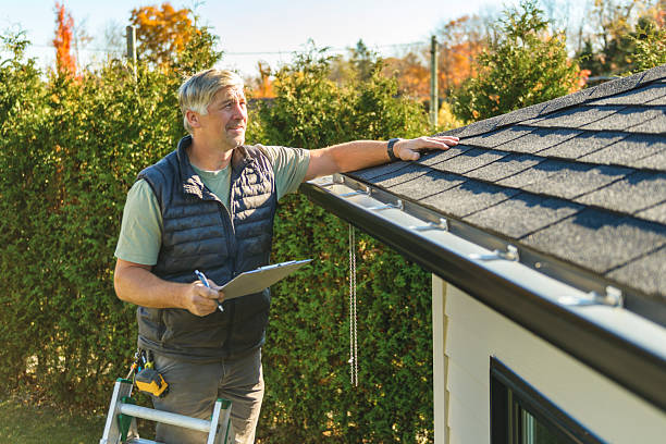 Professional Roofing technician working in Holder, FL